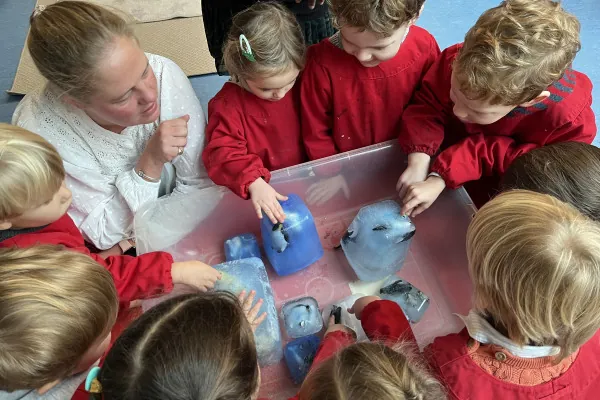 A child enjoying sensory play at Dawmouse Montessori nursery